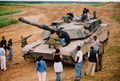 Stoner High School students doing routine maintenance on an SHSIA M1 Abrams tank.