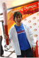 Champ with Olympic Torch.jpg