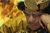 Muammar Gaddafi plays chess in hell.jpg