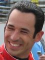 Hélio Castroneves after winning his first CART race and climbing the fence at the 2000 Grand Prix of Detroit.