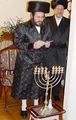 The Bialy Rebbe of America, in his regulation Hasidic Fur Hat and his regulation Hasidic Rebbe Nightgown, on Hannukah