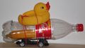 How to make a car * 1 Rubber duck* 1 Coca-Cola bottle* 1 Plastic banana* 1 Red balloon (deflated)* 1 Set of wheels* 75 Pieces of gum