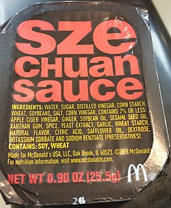Modern McDonalds Szechuan Sauce packet 2018 (cropped close-up).jpg