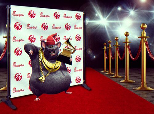 Biggie cheese with his first Grammy Award (circa 1996).jpg