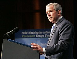Bush at podium at renewable energy conference.jpg
